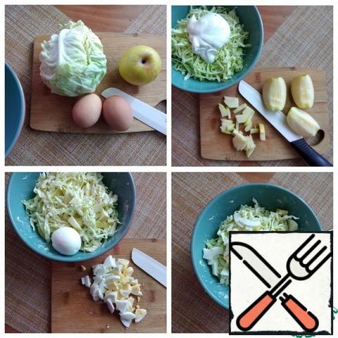 Eggs need to be hard-boiled. Cabbage is thinly cut into long noodles. Spread in a salad bowl and immediately put the mayonnaise on top, do not mix. We will put the cut apples in it so that they do not darken quickly. Apples are well cut with a ceramic knife, they do not oxidize longer from it. Put the apples on the mayonnaise and mix the salad. Chop the eggs. Send to the salad bowl and carefully combine everything, if desired, salt to taste. You can put more mayonnaise to taste. I like a lot of mayonnaise in this salad. What I have indicated is enough for me. I don't pepper this salad. It turns out to be tender and very tasty. Cover with a lid and send to the refrigerator for a little, to infuse.
