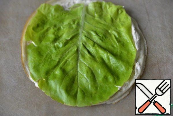 Top with a lettuce leaf.