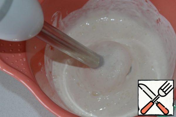 Soak the gelatin in cold water.
Mix cream cheese, sour cream, cream, powdered sugar, vanilla and lemon juice.