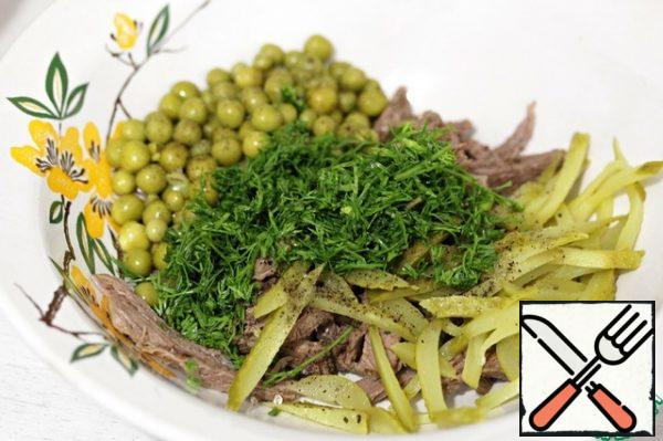 Season the salad with salt and ground black pepper, add chopped dill.