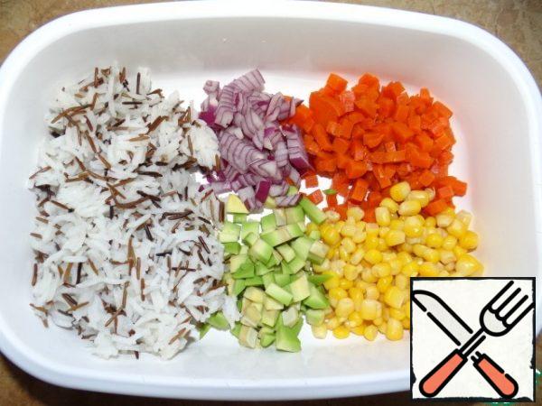 Carrot, avocado, onion cut into small cubes-add rice, corn;