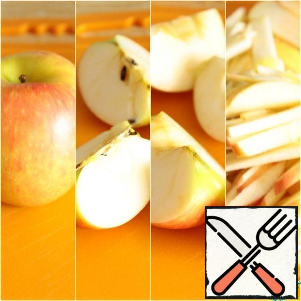 While the salad is infused, remove the core from a large sweet and sour Apple and cut it into strips.