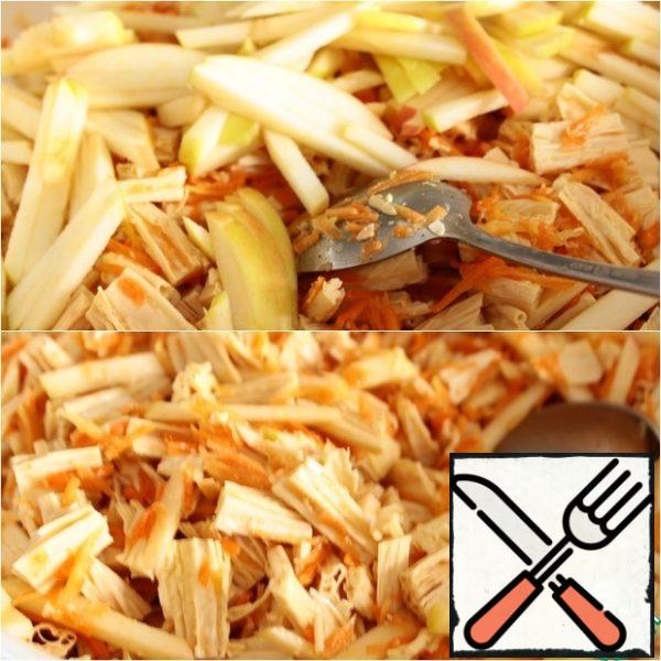 Add an Apple to the salad. Leave to infuse for 1-2 hours. Then mix again and serve. Before serving, fill with mayonnaise, decorate with herbs.