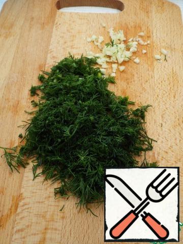 Chop the dill and garlic finely.