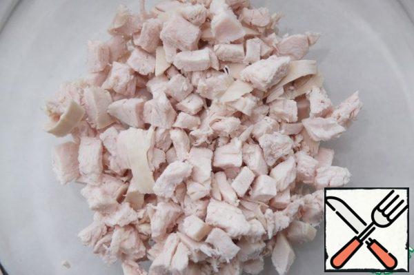 Boil the chicken breast and eggs until tender.
 Cut the chicken into small cubes.