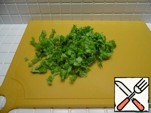 Chop the lettuce.