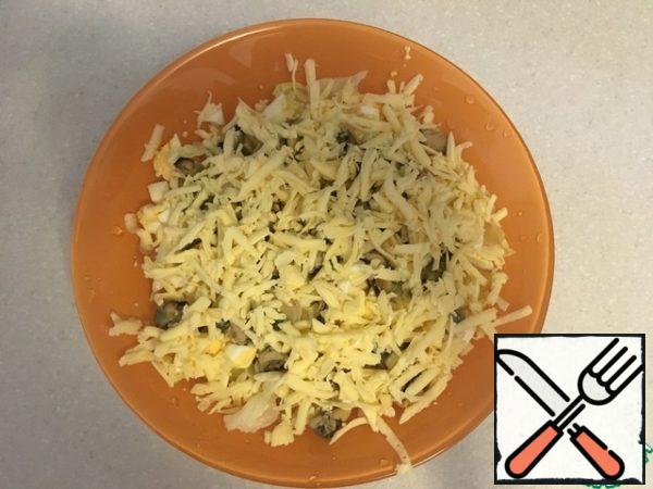 Add the cheese, rubbed on a large grater.