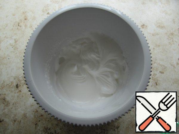 Separate the whites from the yolks and beat to soft peaks with 1/3 of the sugar.