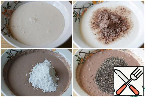 To the yogurt add the cocoa powder and powdered sugar, mix well.
Add the Chia seeds and stir.