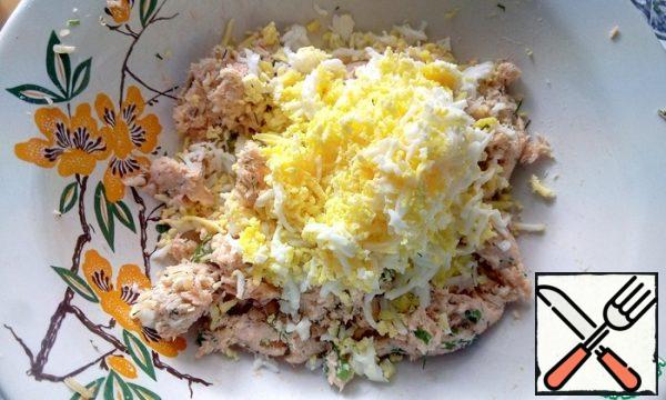 Add eggs, grated on a fine grater.
Mix everything well, form balls, roll them in grated cheese and put them in the refrigerator for 1 hour or longer.
Instead of cheese, you can roll them in chopped greens or ground walnuts.