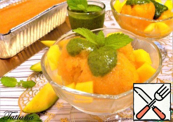In the preparation of sorbet, citrus juice is used, which prevents the formation of large ice crystals. When freezing, the sorbet does not require mixing.
Serve the mango sorbet balls in serving cremans, and don't forget to pour a generous amount of mint pesto on top!
Bon Appetit!!!
