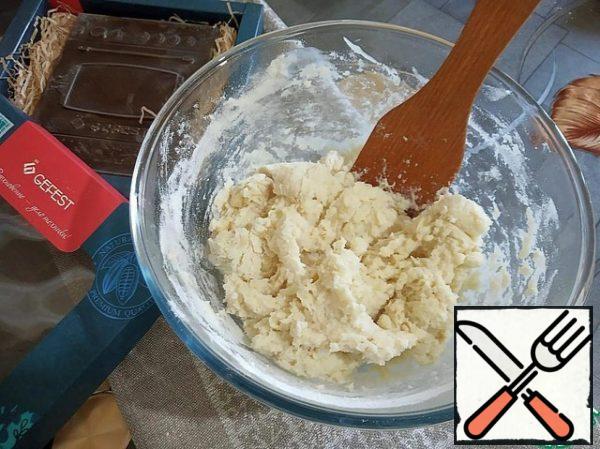 Add boiling water and knead the dough with a spatula.