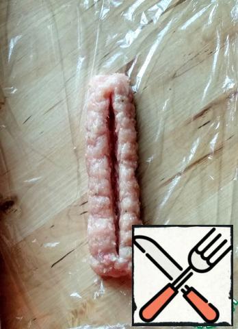Make an incision with a knife.