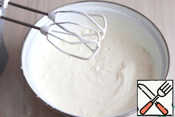 Cream (500 ml.) beat on medium speed. After a clear trace from the whisk of the mixer is formed on the surface of the cream, add lemon juice (2 tablespoons) to the cream, add 50 gr. powdered sugar. Then whisk the cream to the desired density, then add the gelatin solution. Mix the cream well.