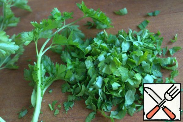 Cut parsley or other herbs.