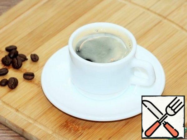 To make some coffee. I brewed 180 ml of coffee in an electric coffee maker. Strength of coffee to your taste. The stronger the cake, the more delicious and flavorful it is.