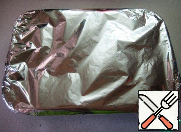 Cover the form with foil and send it to a preheated 180-degree oven for 30 minutes.