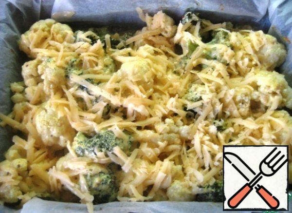 Then remove the mold, carefully remove the foil and evenly sprinkle the top with grated hard cheese.