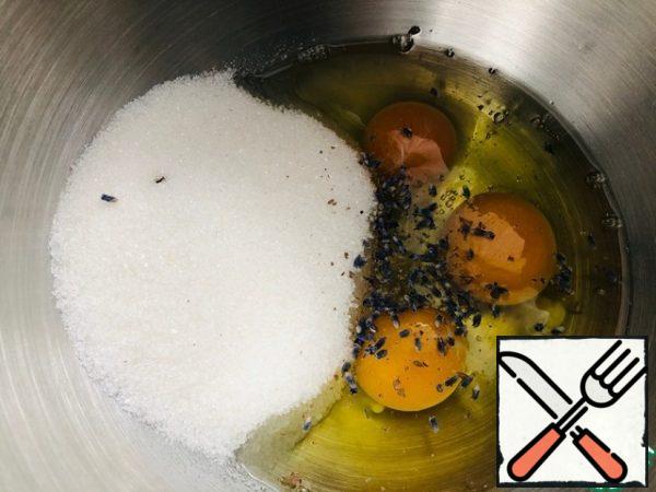 Preparing a biscuit:
- Beat eggs with sugar and lavender flowers at the highest speed of the mixer for 5-7 minutes.