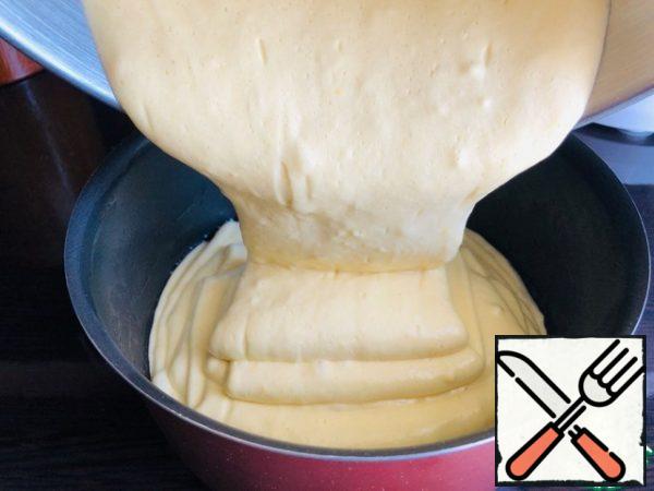 - Transfer the dough to a baking dish (diameter 18 cm), greased with oil.
- Put in a preheated 180*C oven for 30-35 minutes (check readiness with a toothpick).