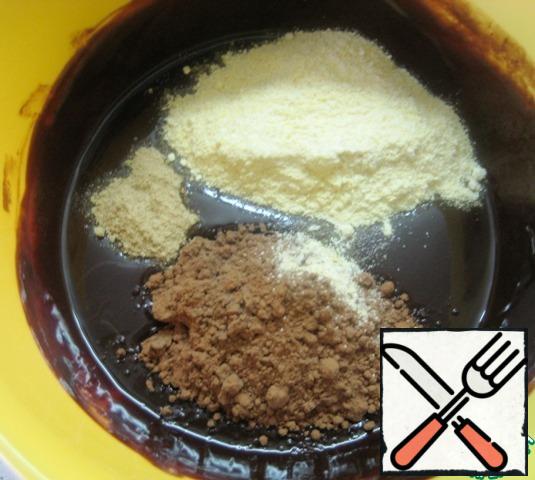 Add corn flour, cocoa and ginger to the chocolate mixture (I used dry crushed ginger). Gently mix with a spatula.