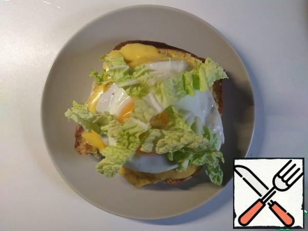 Put salad on egg.