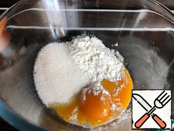 Prepare the cream - mousse:
- Mix the yolks, starch, and sugar with a whisk until light.