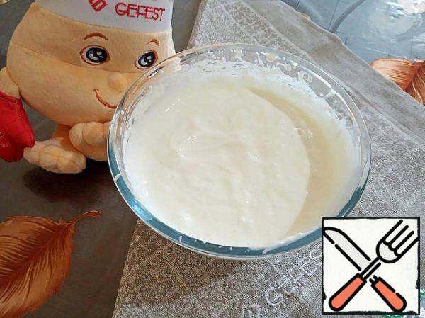 Sour cream, powdered sugar and vanilla whisk for a couple of minutes.