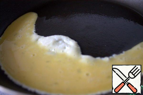Preheat the pan with any oil, then turn down the heat.