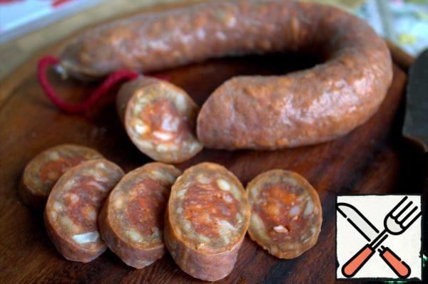 I keep a ring of spicy chorizo sausage in the freezer for these occasions. It is also good in stewed cabbage and in pots, sharp.