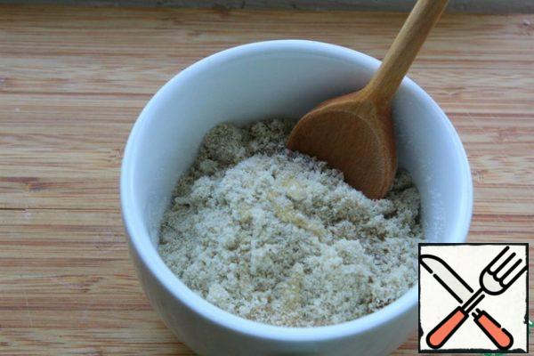 Punch the seeds with powdered milk.
Gradually, adding honey, make a sticky mass.
I needed a little more honey.