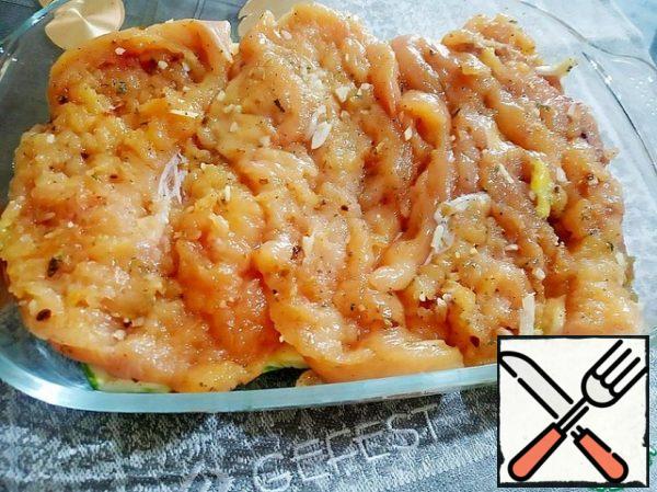 Put the chicken fillet on top of the vegetables.