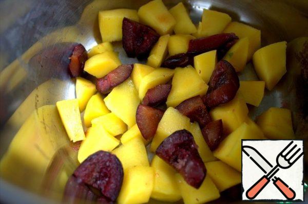 Crumble the plum in the mango.
