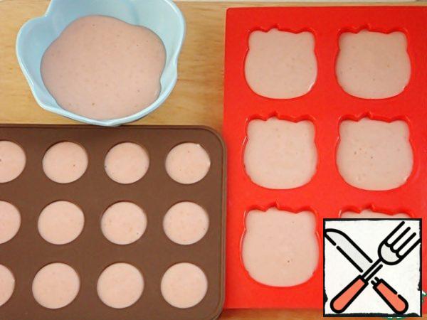 Spread the mixture into silicone molds. It is convenient to do this with a pastry bag. The mass thickens quickly enough, so you should act quickly. Place the molds in the freezer for 30-40 minutes.
You can make burfi round. In this case, the mass must be put in the refrigerator. It will become plastic. And it will be easy to form balls from it.

Release the dessert from the molds and serve it to the table.