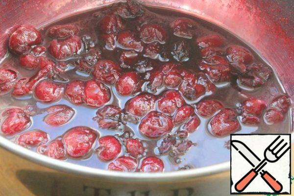 Cherry jam.
Bring the cherries, dried cranberries, sugar and lemon juice to a boil and cook over low heat for 5 minutes. If for adults-add rum.
Cool and drain a little.