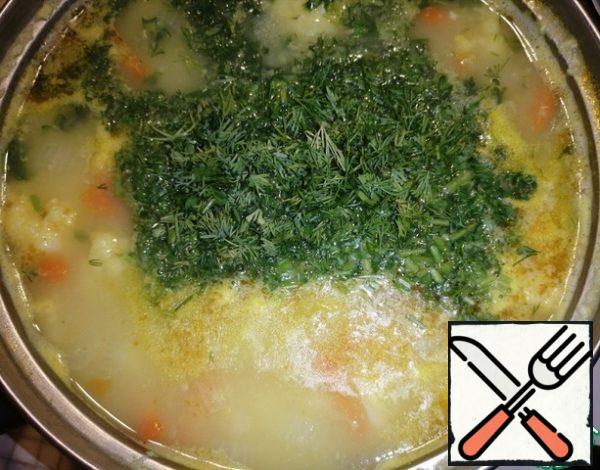 Add the melted cheese and finely chopped herbs. Add salt to taste and mix well. Cook for 10 minutes. 