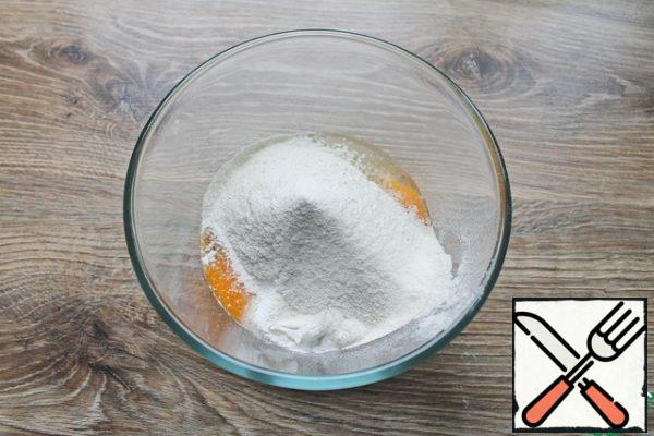 Sift the flour into a bowl.