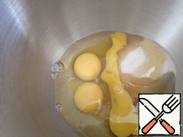 Eggs, honey, sugar beat with a mixer until the mass increases three times.