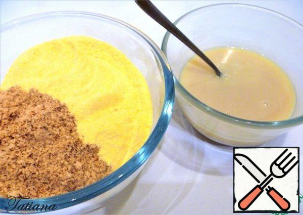 Chop the cornflakes and almonds (separately) and mix with the melted chocolate.