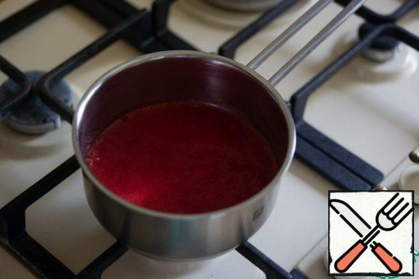 Bring the berry puree to a boil.