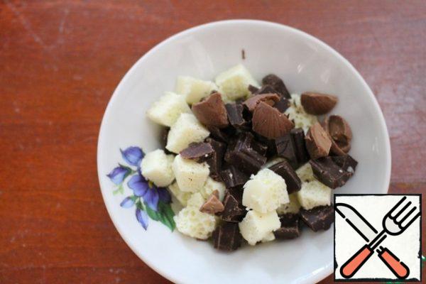 Milk, dark and white chocolate (each take 30 g) cut into pieces.