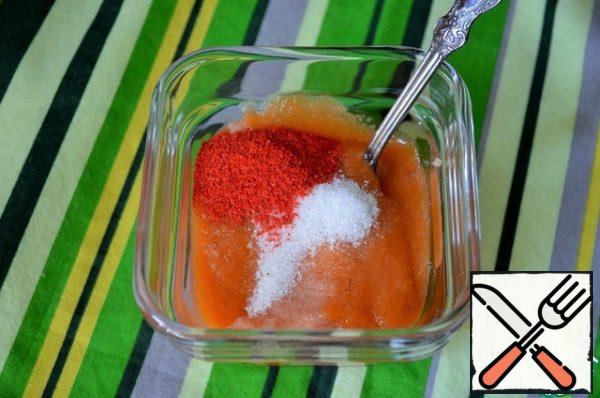 Add sugar and hot red pepper to the caviar.