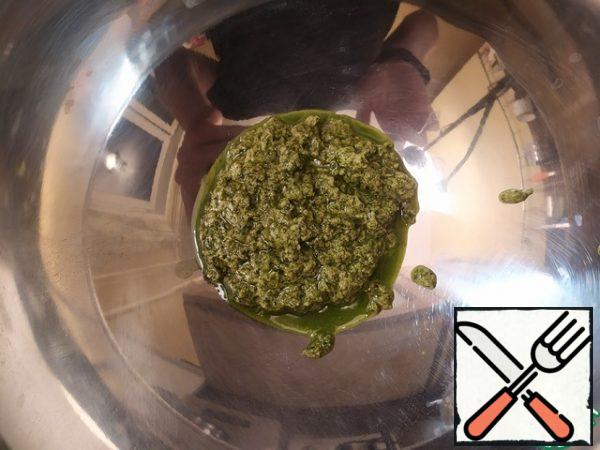 Transfer the pesto to a larger bowl.
