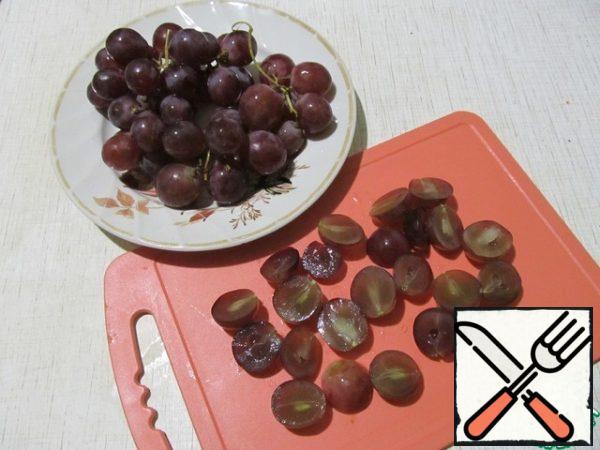 Grapes cut in half. If the bones in the way, to remove.
I love bones and crunchy, and healthy.