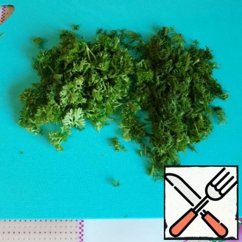 Cut the dill and parsley into small pieces.
