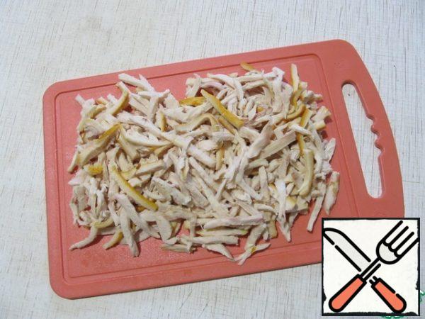 Cut the smoked chicken breast into strips.