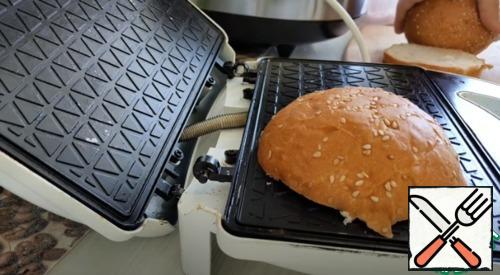 First, fry the rolls on both sides on the grill or in a pan.