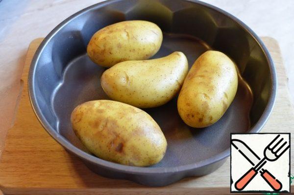 Bake in the oven for about an hour at 160 degrees. The baking time may change, depending on the quality and size of the potatoes.