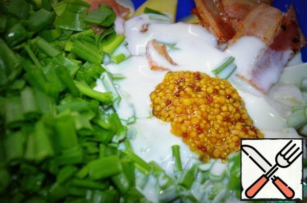 Add finely chopped green onions and season with yogurt and mustard ( I forgot to buy regular mustard, so I added grainy)