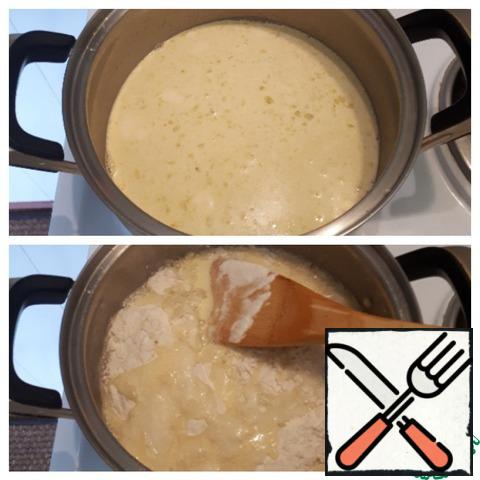 Prepare the custard dough. In a saucepan, bring water and margarine to a boil and add salt. Add flour to the boiling mixture.